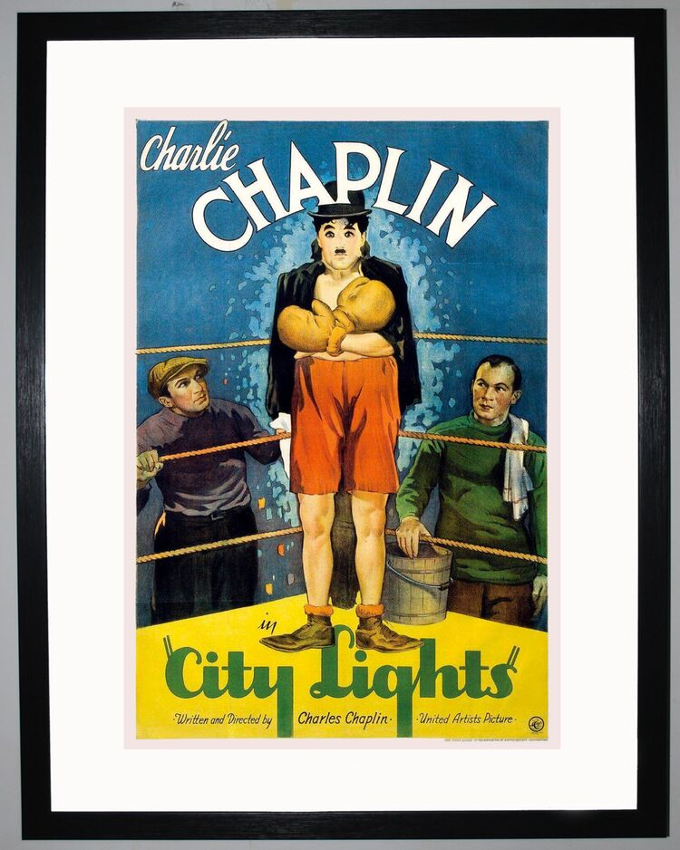 City Lights starring Charlie Chaplin Framed Art Print by Film Classics