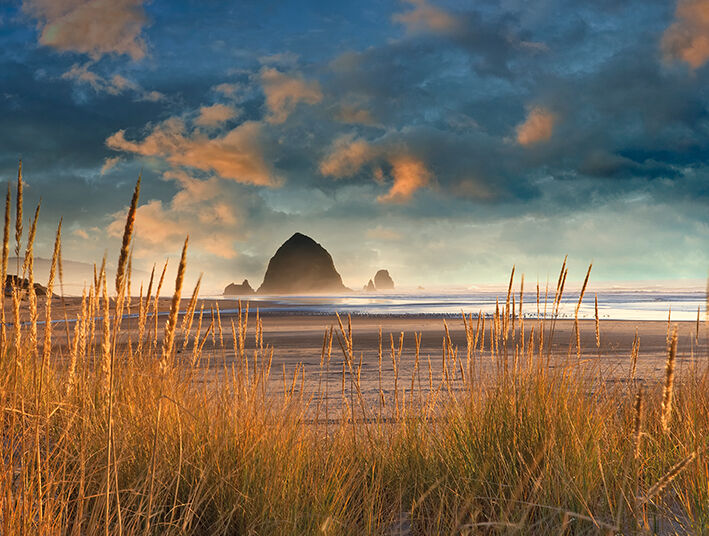 Haystack Rock at Cannon Beach Canvas Art Print by Dennis Frates