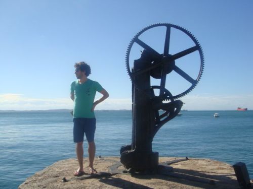 Andy Weir, standing by a sculpture
