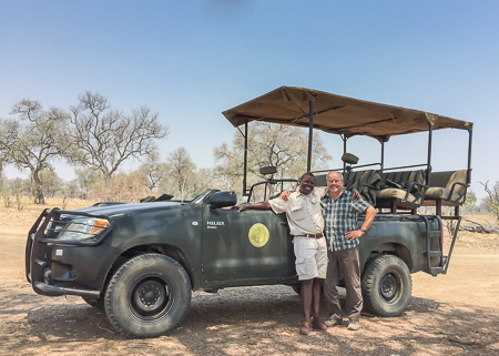 Yoram, me and our trusty vehicle (canopy on only for this trip back to the airport)