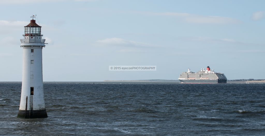 Queen Victoria passing New Brighton lighthouse