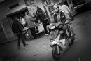 Man on the scooter rides along the street