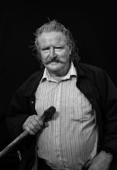 Portrait of the pilgrim, man with walking stick