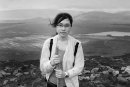 Croagh Patrick female pilgrim portrait, Asian girl wit a walking stick