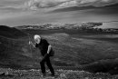 Croagh Patrick male pilgrim climbs the mountain with a walking stick