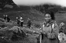 Croagh Patrick female pilgrim portrait, girl with a walking stick.