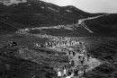 General view from the distance of people climbing the Croagh Patrick