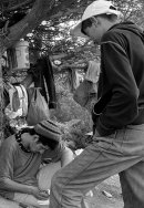 2 boys in would-be immigrants' camp in the forest
