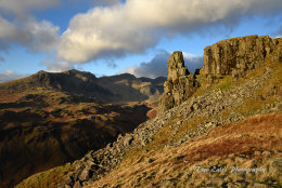 Eskdale Needle with the Scafells beyond.