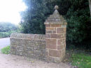Dry stone wall and historic gate piers.