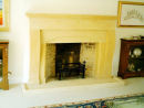 Cotswold stone fireplace.