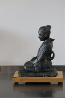 Seated Japanese lady in traditional dress