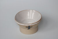 Bowl with compound interior profile