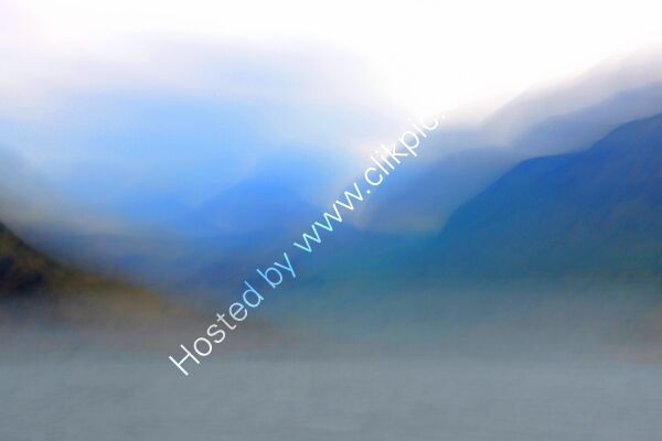 BETWEEN THE CLOUDS AT CRUMMOCK WATER