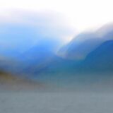 BETWEEN THE CLOUDS AT CRUMMOCK WATER