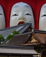 A temple and three masks