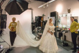 June working on set with model and makeup artist