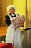 Maid bemused by corset!