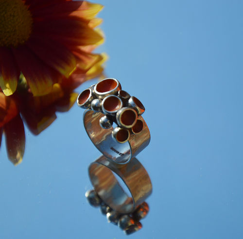 Sterling silver orange enamel ring.