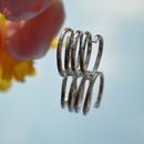 Sterling silver wrap ring with black spots