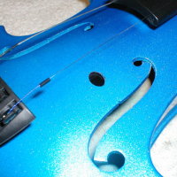 Hole prepared for the through soundpost