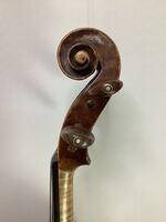 R24 French Remy violin scroll side