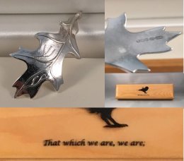 A bespoke and unique silver anniversary pendant