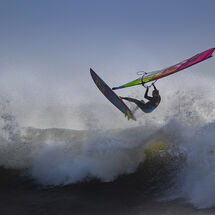 Jumping a backlit wave