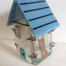 House with blue roof
