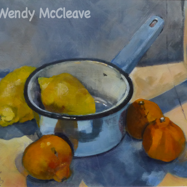 Blue Saucepan and Citrus Fruit Still life acrylic painting on prepared paper of lemons, satsumas and a blue enamel saucepan in a top lit box.