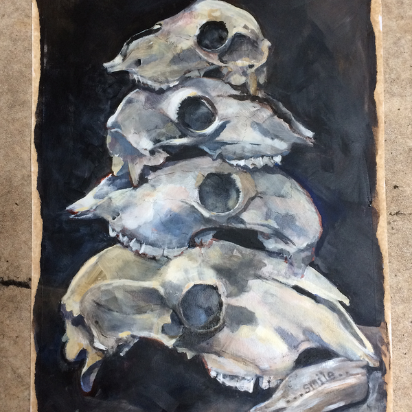 Acrylic on prepared paper of a pyramid of sheep skulls and a small piece of driftwood with 'Smile' burned onto it.