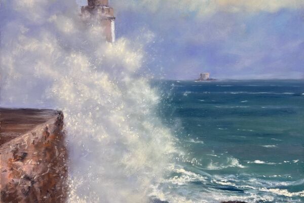 St Peter Port lighthouse in the storm