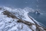 07 Durdle Door at Dusk in a Snowstorm by Tony Gill