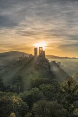 Corfe Castle Sunburst by Rob Bridge