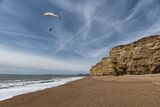 Paraglider over Burton Bradstock by Rob Bridge