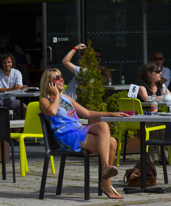 On the phone in the sun