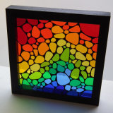 Rain bow pebble framed mosaic